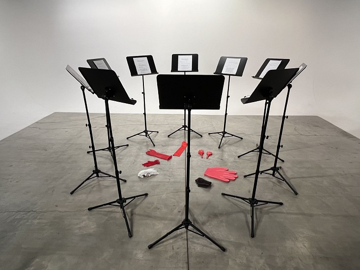 KLARA DU PLESSIS, APOSTROPHE
2026, INSTALLATION WITH MUSIC STANDS, POETRY SCORE AND GLOVES